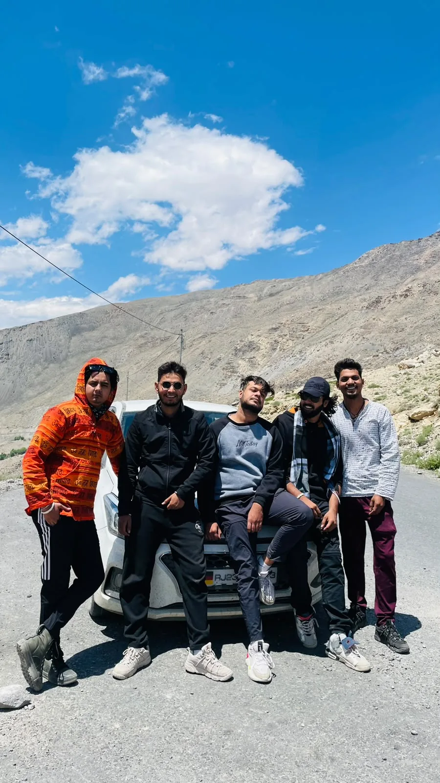 A group of travellers together in the mountains
