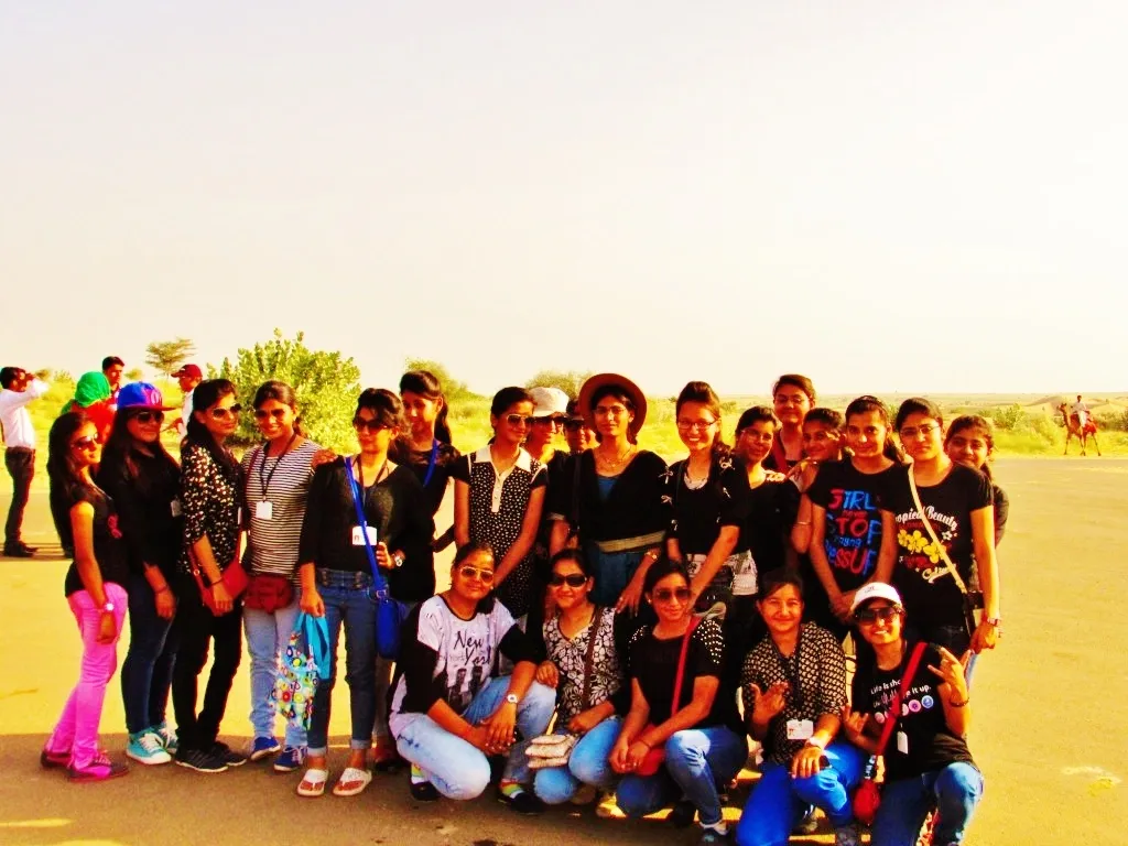 A student travel group gathered outdoors